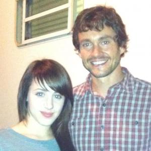 Torianna (looking very pale for a reason) on Hannibal set with actor Hugh Dancy