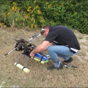Pilot Eric Austin of Heli Video preps the remote-control drone chopper for a 