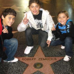 Robert, Ryan, and Raymond Ochoa in front of Director Robert Zemeckis' star on The Hollywood Walk of Fame