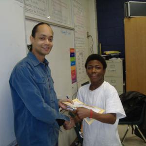 Volunteer King and student, Champion Theme School.