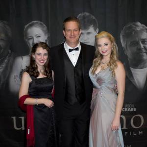 Stacey Bradshaw with director Bill Rahn and star Courtney Buck at the red carpet premiere of Uncommon also starring Ben Davies and Erik Estrada