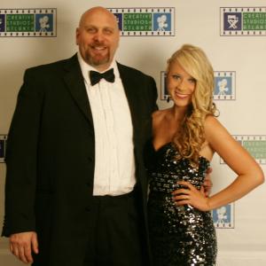 Madison with her Santas Bootcamp director Ken Feinberg on the red carpet