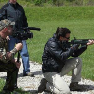 With Patrick Kilpatrick while shooting at the range in 
