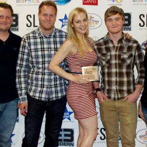 Amy Lia with some of the crew of The Retribution of Tom Percival at the 48 Hour Film Fest Award Show. Amy Lia is holding the plaque for 