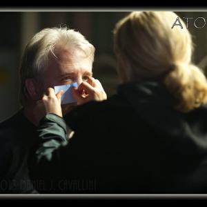Jim Dougherty being touched up before going on camera by Kim Conolly
