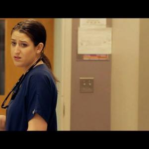 Kelli-Anne Harris as Nurse Boyle in 