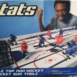 Justin Myrick on the toy box cover of Stats Hockey at Toys R Us