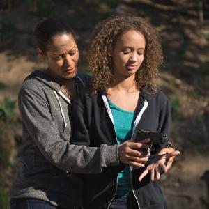 Still shot Cynthia Kaye McWilliams and Zayden Bates in Surviving The Dead.