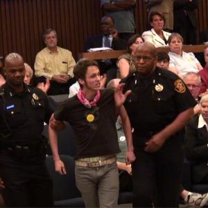 Queer LiberAction founder Blake Wilkinson escorted out of Fort Worth City Council Chambers after heated exchange with Mayor Mike Moncrief From documentary Raid of the Rainbow Lounge