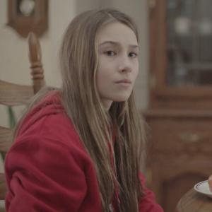 Kylie plays Gloria in the short film Homesick by Chris Cole