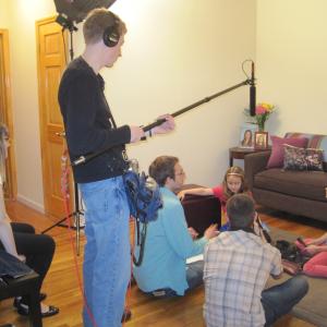 Kylie with director Tim Young Jason Johnson on camera  Jesse Flaitz on sound  filming the webseries Sitting on Babies