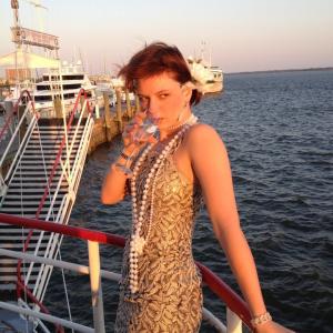 as Savannah Middleton in Charleston Harbor Tours murder mystery cruise.