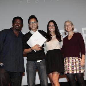 NBC Shorts hosts Craig Robinson and Olivia Munn with Christopher Dinh  Recipient Best Short Film Crush the Skull Dir Viet Nguyen and Suzanne Lezotte Panavision