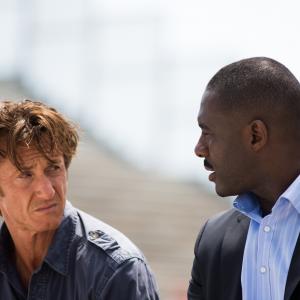Still of Sean Penn and Idris Elba in The Gunman 2015