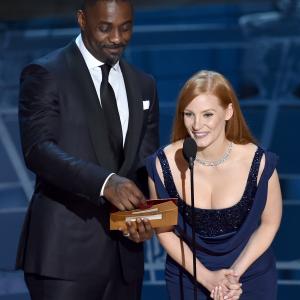 Idris Elba and Jessica Chastain at event of The Oscars (2015)