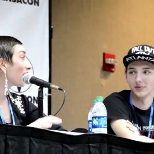 American Horror Story: Freak Show Actors Naomi Grossman and Jerrad Vunovich sit at a panel in front of hundreds of fans discussing the show at a Comic Con