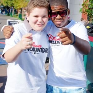 Cade Sutton with Mekai Curtis at Disney's Family Volunteer Day