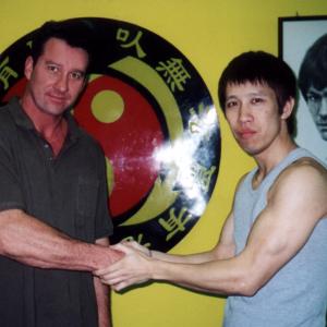 Richard O Ryan aka Richard Ryan with an appreciative student after training a class of Jeet Kune Do in Hong Kong