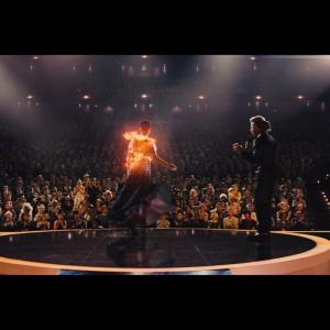 The Hunger Games Catching Fire in the white suit with the orange belt