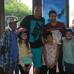 Ella with NBA stars Shawn Marion and Ricky Rubio on set of 