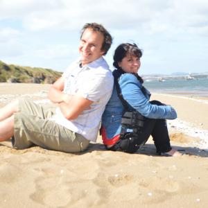 Shawn Watson and Michelle Samantha Roberts pose for a photo on Hound Point Beach