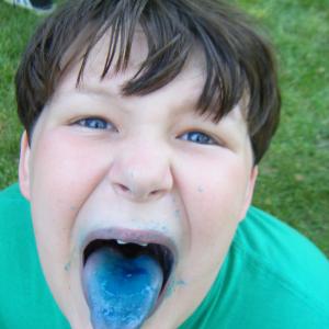 June 2012, F-U-N at Cub Scout Day Camp. Cotton candy + boy = good time!