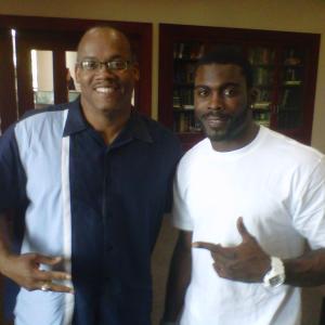 ProducerDirector Greg Carter and Philadelphia Eagles star quarterback Michael Vick Wrapping up a production meeting for the feature documentary Michael Vick Giving Back
