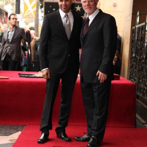 ManagerProducer Chris Roe with Actor Malcolm McDowell Malcolm McDowell Honored With A Star On The Hollywood Walk Of Fame on March 16 2012 in Hollywood California