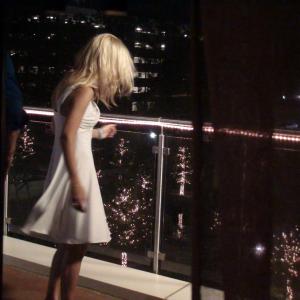 Kelly Park on the balcony at Crush Wine Bar in a scene from Breaking Down