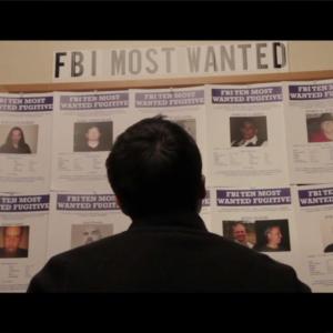 William among the FBI's Most Wanted in the movie Masked