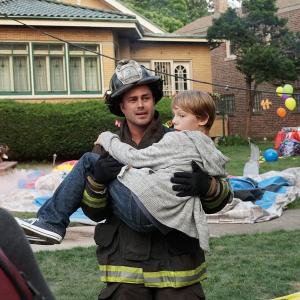 Jaden Klein as Kevin Sullivan with Taylor Kinney as Kelly Severide on Chicago Fire 2015
