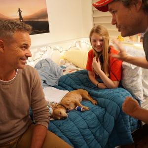 Cameron Daddo, Scamps, Lizzy Kay and Michael Bond in a scene from Elle