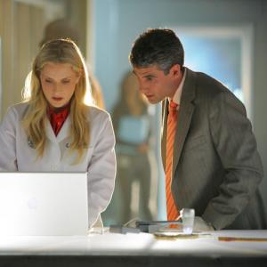 Michael B Silver and Emily Procter in CSI Majamis 2002