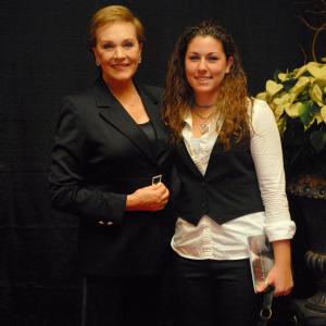 Unfortunately an unclear picture taken at a Julie Andrews convention where Kristin was given the honor of teaching Mrs Andrews the Aggie tradition of a thumbs up