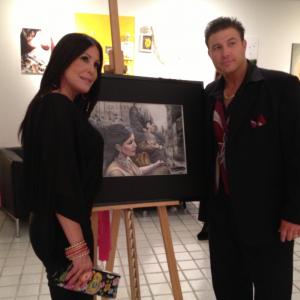 Michael Bell filming a Red Carpet painting unveiling with Toni Marie Ricci for Mob Wives Season 3