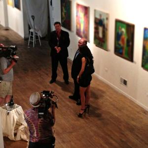 Michael Bell with Dominic Capone and Staci Richter on set of The Capones filming a painting unveiling