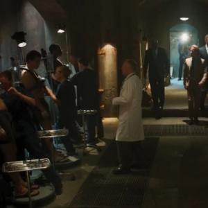 David Goebel as AIM Doctor applying Extremis virus with with Guy Pearce in Iron Man 3