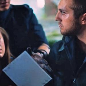 Still of Niki Cipriano (front left), and Gino Borri (right) in Lost In The Echo, by Linkin Park