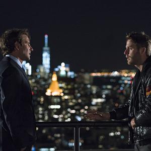 Still of Bradley Cooper and Jake McDorman in Limitless (2015)