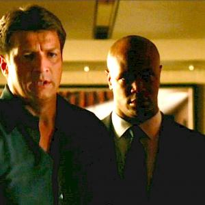 Still of Isaac Johnson and Nathan Fillion in Castle