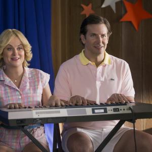 Still of Bradley Cooper and Amy Poehler in Wet Hot American Summer First Day of Camp 2015