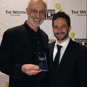 Aaron Wolf presenting Michael Gross with the Career Achievement Award