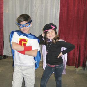 Evan with his sister Ana in a Fashion show wearing Baby Bop Designs (April 2011)