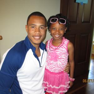 Brooke Singleton and Trai Byers on set of the film The Option Arm