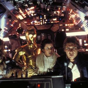 Still of Harrison Ford Anthony Daniels Carrie Fisher and Peter Mayhew in Zvaigzdziu karai Imperija kontratakuoja 1980