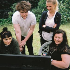 Gage Oxley reviewing the filming with (L-R) Emily Cairns, Gracie Burton and Niamh Kirby