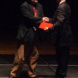 Fethi Bendida accepting his certificate filmmaking from his instructor Howard Phillips graduating from CDIA Boston University filmmaking  2009