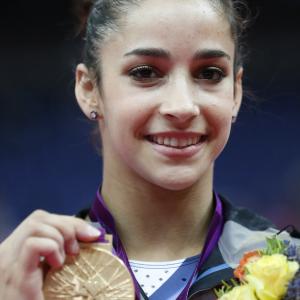 Gold medalist US gymnast Alexandra Raisman poses on the podium of the womens floor exercise of the artistic gymnastics event of the London Olympic Games