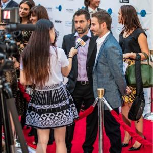 Directors Jordan Horowitz and Frank Ferendo speak to press on the red carpet at the Hollywood Film Festival
