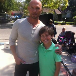 Jake as Tommy Sikes on set with actor Luke Goss on feature film April Rain